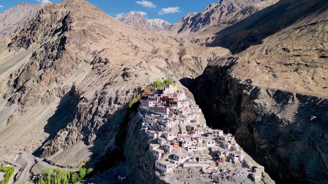 Aerial view of Diskit Monastery nestled in the rugged mountains of Ladakh with its traditional architecture and surrounding arid landscape Diskit, Ladakh, India.