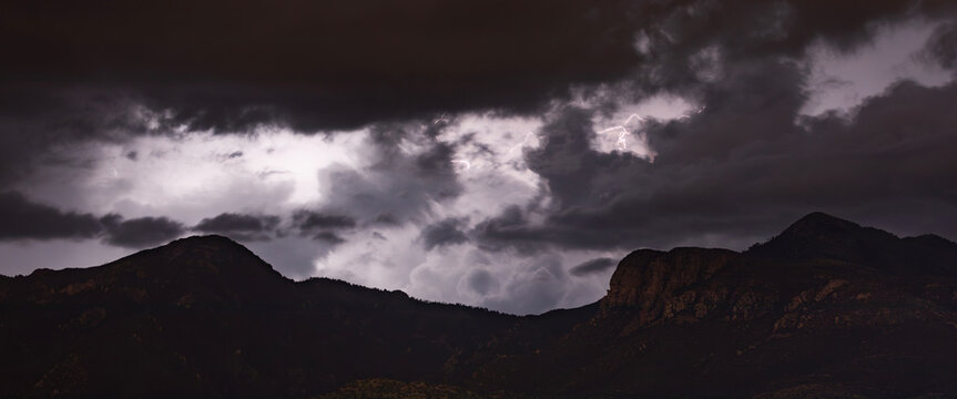 Thunderstorm at night behind Arizona's Huachuca Mountains