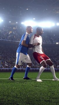 Two Soccer Players in a Tense Shoulder-to-Shoulder Duel