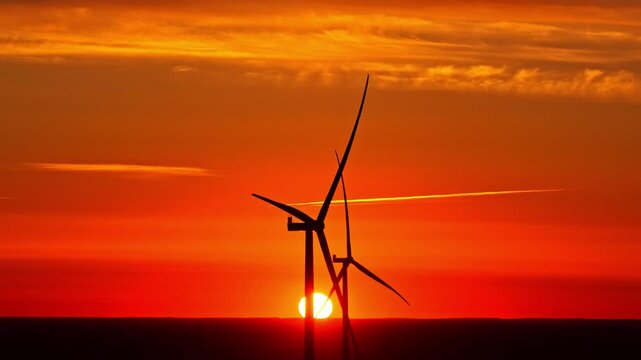 Aerial view of wind turbines at sunset in Kaigu Purvs, Livberze parish, Jelgava Municipality, Latvia.