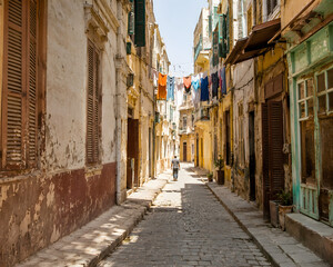 Fototapeta premium Narrow Alleyway In Historic Alexandria Old Town Egypt