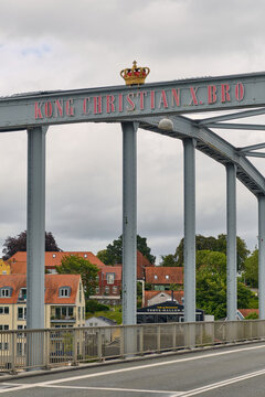 Sonderborg, Syddanmark, Denmark - 07 July 2026: View of King Christian X Bridge with its iconic crown emblem and steel structure overlooking the town of Sonderborg.