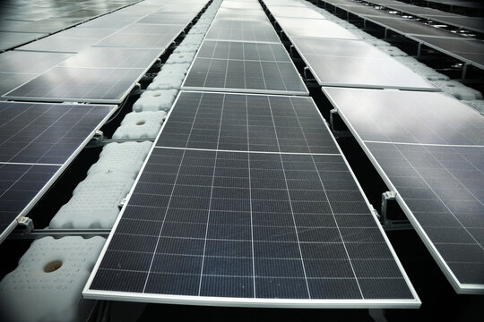 Aerial view of floating solar panels on water in Berau Regency, East Kalimantan, Indonesia.