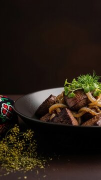 Gourmet Kuurdak beef offal stir-fry with caramelized onions, minimalist presentation with deep brown copy space