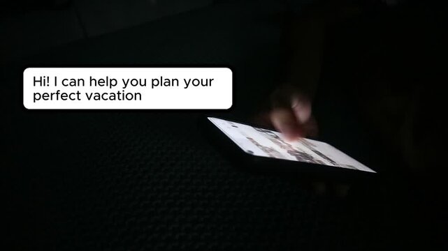 Person using a smartphone to interact with an artificial intelligence travel planning chatbot assistant.