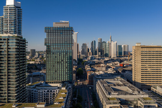Frankfurt am Main, Germany - 18 June 2026: Aerial view of Spin Tower surrounded by modern skyscrapers and urban architecture under a clear blue sky in Frankfurt am Main, Germany.