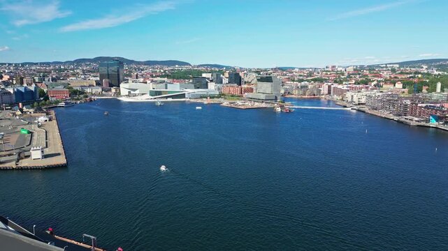 Aerial view of the modern Oslo Opera House and Munch Museum situated along the fjord waterfront in Oslo, Oslo, Norway.