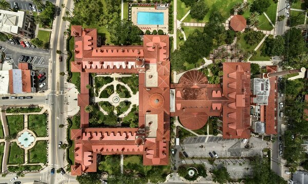 Aerial view of Flagler College, formerly the Hotel Ponce de Leon, with its red-tiled roofs and central courtyard in St. Augustine, Florida, United States.
