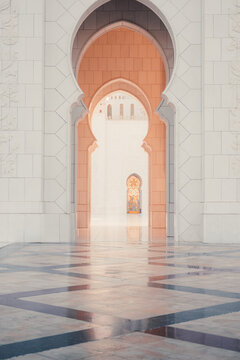 Abu Dhabi, United Arab Emirates - 20 April 2024: View of the intricate arches and marble floors of the Sheikh Zayed Grand Mosque in Abu Dhabi.