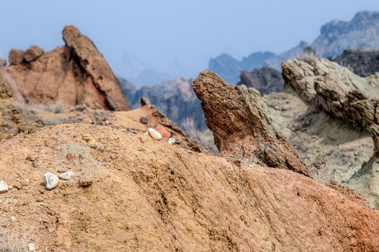 View of the rugged rock formations and arid landscape of the Sulaiman Mountains in De-excluded Area Dera Ghazi Khan, Punjab, Pakistan.