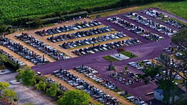 Aerial view of a cemetery with rows of stone graves and pathways in Nantes, Pays de la Loire, France.
