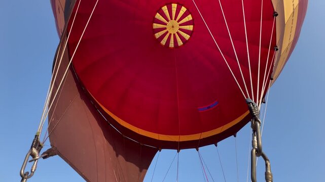putting fire flame inside the hot air balloon, Laos, Vang Vieng	
