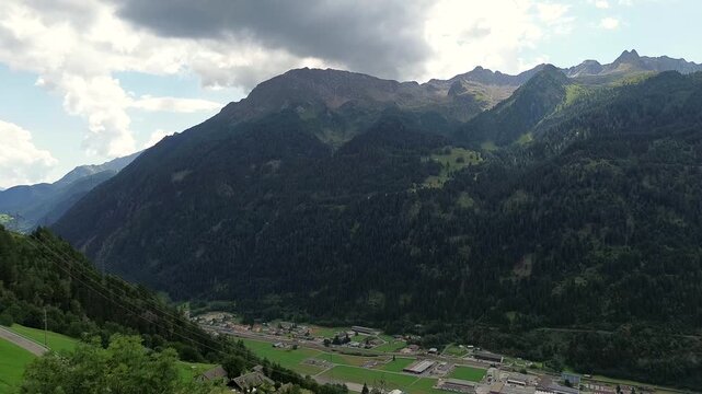 Aerial view of the lush green mountain valley and town landscape in Quinto di Treviso, Veneto, Italy.