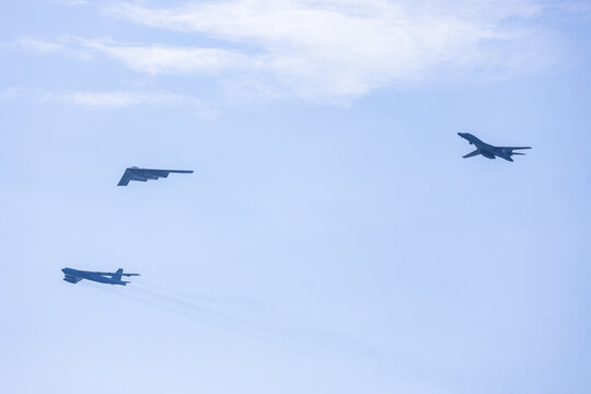 Jersey City, New Jersey, United States - 04 July 2026: View of a military flyover with a B-2 Spirit, B-52 Stratofortress, and B-1 Lancer flying in formation over Liberty State Park.