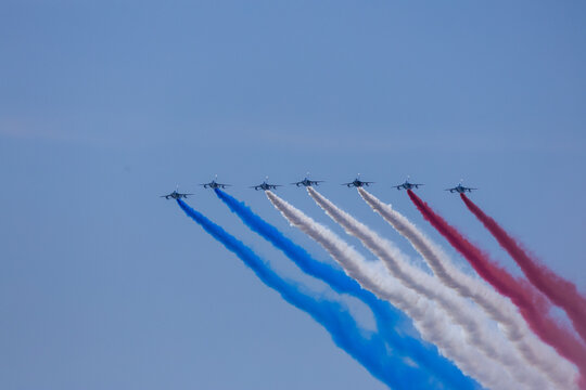 Jersey City, New Jersey, United States - 04 July 2026: View of jets performing an air show with red, white, and blue smoke trails over Liberty State Park.