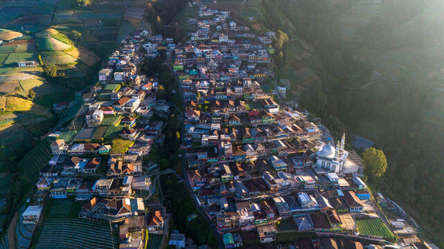 Aerial view of Nepal Van Java, a village with colorful houses and terraced fields on the slopes of Mount Sumbing, Kecamatan Kaliangkrik, Jawa Tengah, Indonesia.