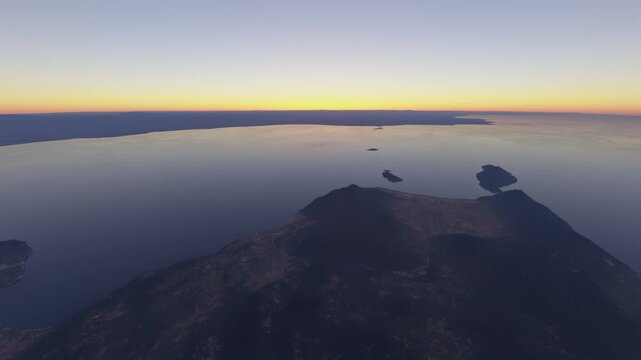Circular aerial drone view at sunset of Lake Malawi National Park. Malawi
