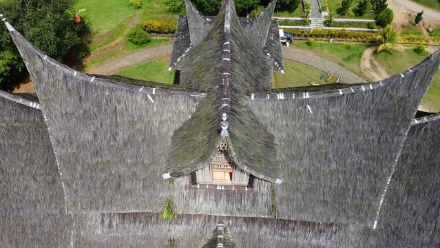 Aerial view of Istano Basa Pagaruyung featuring traditional Minangkabau architecture with tiered thatched roofs in Kecamatan Tanjung Emas, Sumatera Barat, Indonesia.
