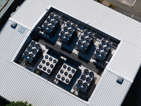 Aerial view of HVAC cooling ventilation units on the roof of the Six Degrees Data Centre in Studley, England, United Kingdom.