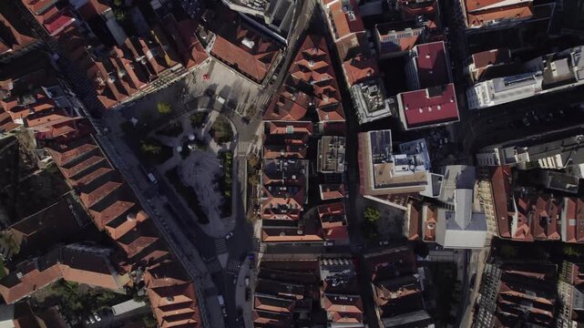 Aerial view of the historic old town of Porto with its characteristic red-tiled rooftops and narrow streets in Porto, Porto District, Portugal.