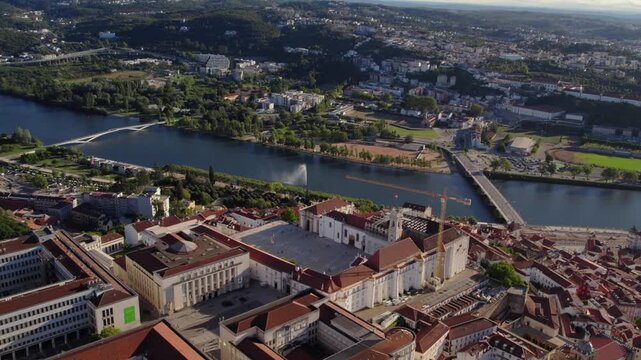 Aerial view of the historic University of Coimbra and its Paco das Escolas courtyard overlooking the Mondego River in Coimbra, Coimbra, Portugal.