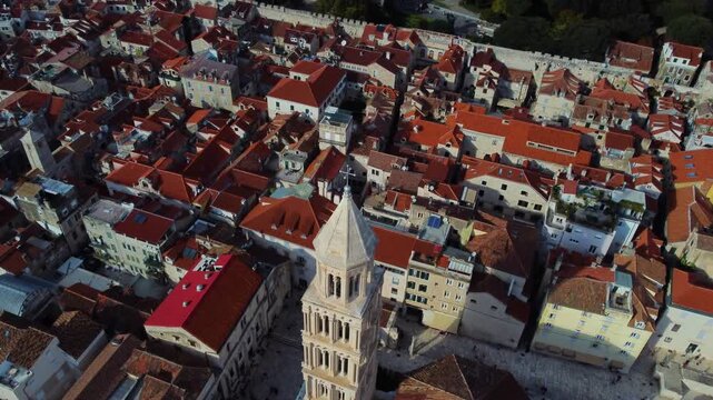 Aerial view of Saint Domnius Cathedral surrounded by historic stone buildings and red rooftops in the old town of Split, Splitsko-dalmatinska, Croatia.