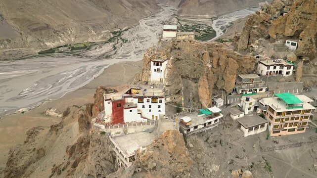 Aerial view of Dhankhar Monastery perched on a rocky cliff overlooking the Spiti Valley in Dhankhar, Himachal Pradesh, India.