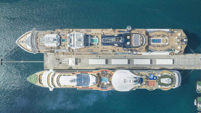 Nassau, The Bahamas - 08 July 2026: Aerial view of Nassau Cruise Port with two large cruise ships docked side by side in the turquoise Caribbean Sea.