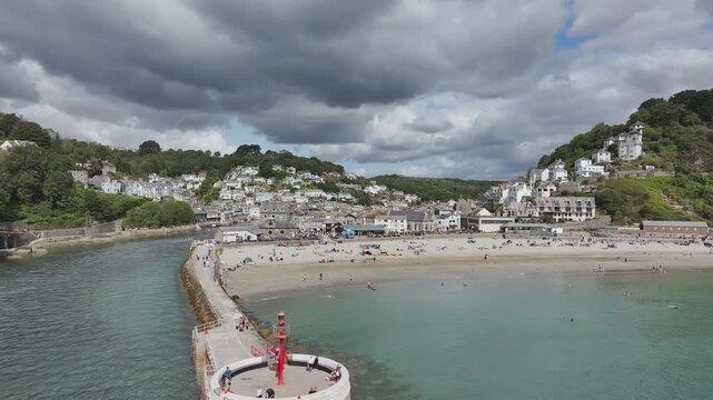 Beach and Cliffs over Looe Bay from a drone, Looe, River Looe Cornwall, England