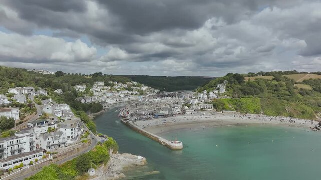 Beach and Cliffs over Looe Bay from a drone, Looe, River Looe, Cornwall, England