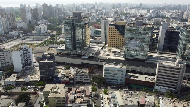 Aerial view of the modern glass skyscrapers and urban landscape of the San Isidro financial district in San Isidro, Lima Province, Peru.