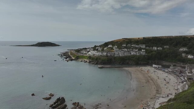 Beach and Cliffs over Looe Bay from a drone, Looe, River Looe Cornwall, England