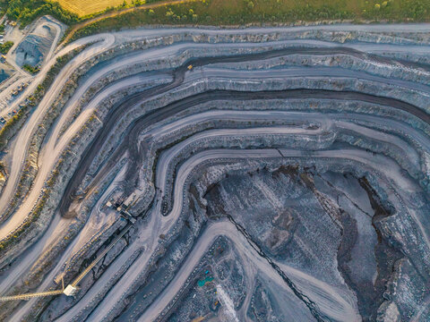 Aerial view of Lemay Quarry Vaulx showing deep terraced levels, industrial mining roads, and stone extraction zones in Antoing, Region wallonne, Belgium.