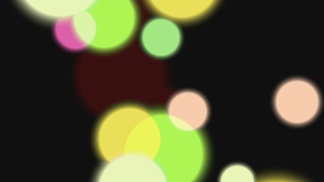 Neon light circles on a dark background for dynamic designs, party invitations, music events, posters, and abstract backgrounds.
