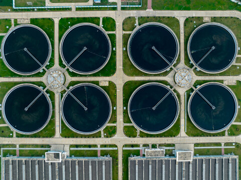Aerial view of Aftab Nagar wastewater treatment plant featuring circular sedimentation tanks and industrial infrastructure in Dhaka, Dhaka Division, Bangladesh.