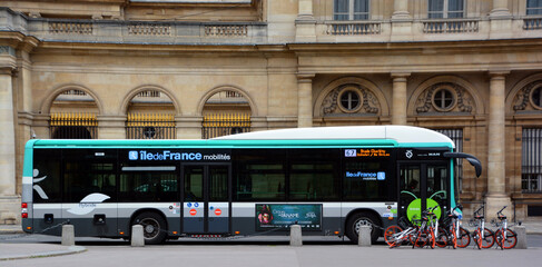 Obraz premium PARIS FRANCE: Public bus of Paris, Metro, RER train, tramway. The Paris public transport network serves the entire city and all its suburbs.