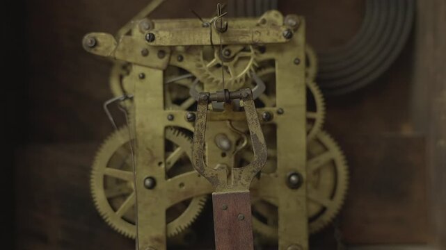 Conceptual shot of distorted, warped mechanical clock gears and a swinging pendulum representing abstract time, memory loss, aging, or a dream state.