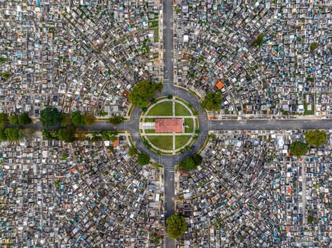 Aerial view of Maximo Gomez National Cemetery with its distinct circular layout, dense rows of graves, and central plaza in Santo Domingo, Distrito Nacional, Dominican Republic.