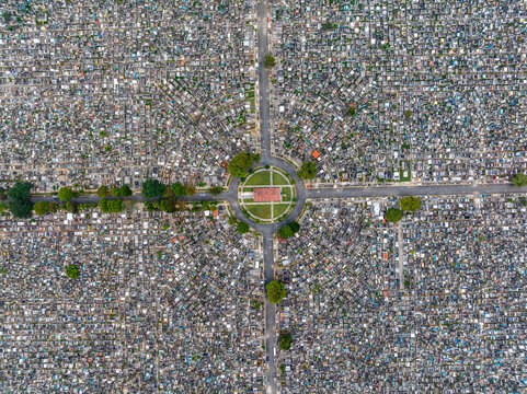 Aerial view of Maximo Gomez National Cemetery featuring a dense grid of graves and a central circular plaza with trees in Santo Domingo, Distrito Nacional, Dominican Republic.