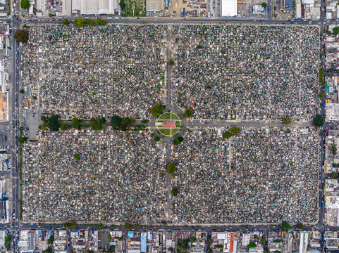 Aerial view of Maximo Gomez National Cemetery with its dense grid of graves and central circular plaza, Santo Domingo, Distrito Nacional, Dominican Republic.