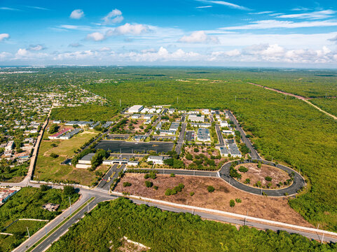 Aerial view of Base de Infanteria de Marina Valm. Manuel Ramon Montes Arache with military buildings, roads, and a roundabout in Boca Chica, Santo Domingo, Dominican Republic.
