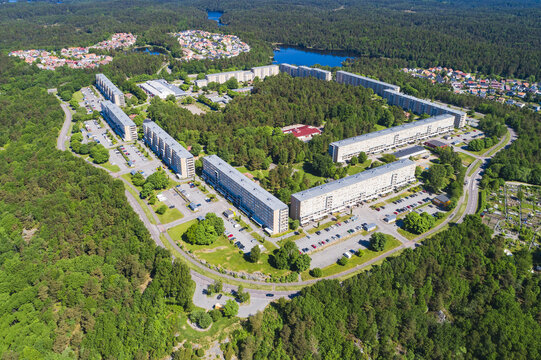Aerial view of Rannebergen residential area with apartment blocks surrounded by dense forests and lakes in Gothenburg, Vastra Gotaland County, Sweden.