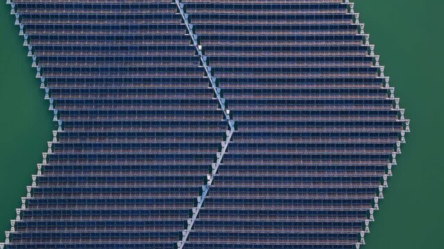Aerial view of the floating solar park on the water surface in Bensheim, Hessen, Germany.