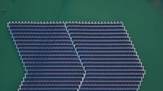 Aerial view of the floating solar park by Rohr on a lake in Bensheim, Hessen, Germany.