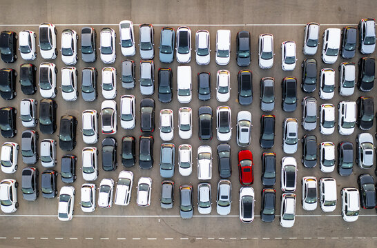 Aerial view of a car lot filled with numerous parked vehicles arranged in neat rows in Ramat Hasharon, Tel Aviv District, Israel.