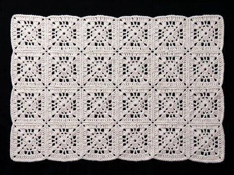 Handmade white crochet granny square placemat vector illustration with lace square motifs and scalloped border on black background