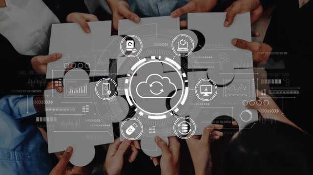 Collaborative Business Team Working on Puzzle Concept with Cloud Computing and Data Analytics Iconography in Modern Office Environment. Entropy.
