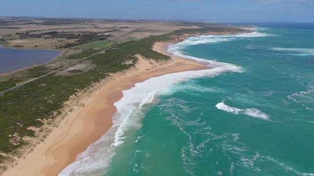 Panoramic Aerial View of Turquoise Ocean Waters and Coastal Landscape at Peterborough along Great Ocean Road, Australia.
