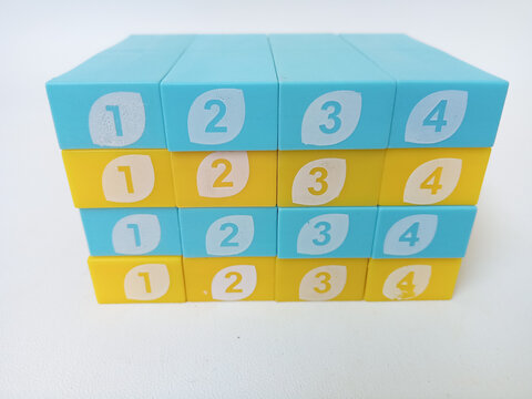 Colorful numbered toy blocks stacked in order