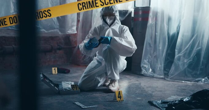 Crime scene specialist examines a female shoe found on the floor during a forensic investigation.